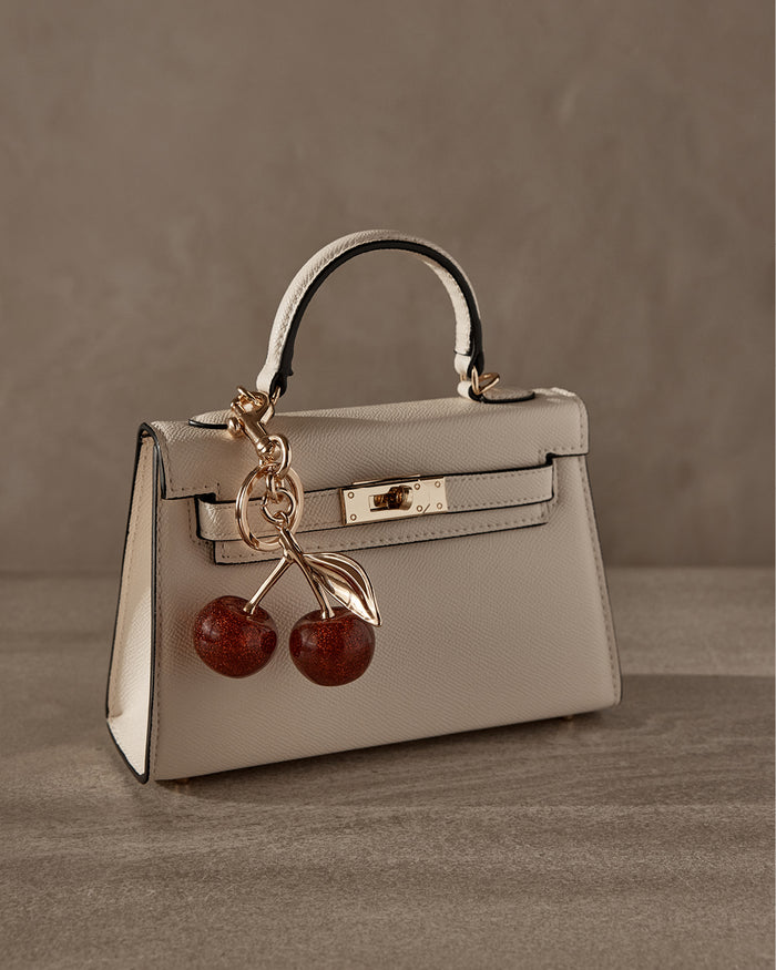 CHERRY BAG CHARM GOLD - Main Image